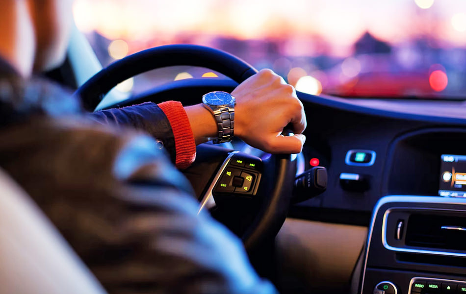 Person Driving a Car Avada Car Dealer News